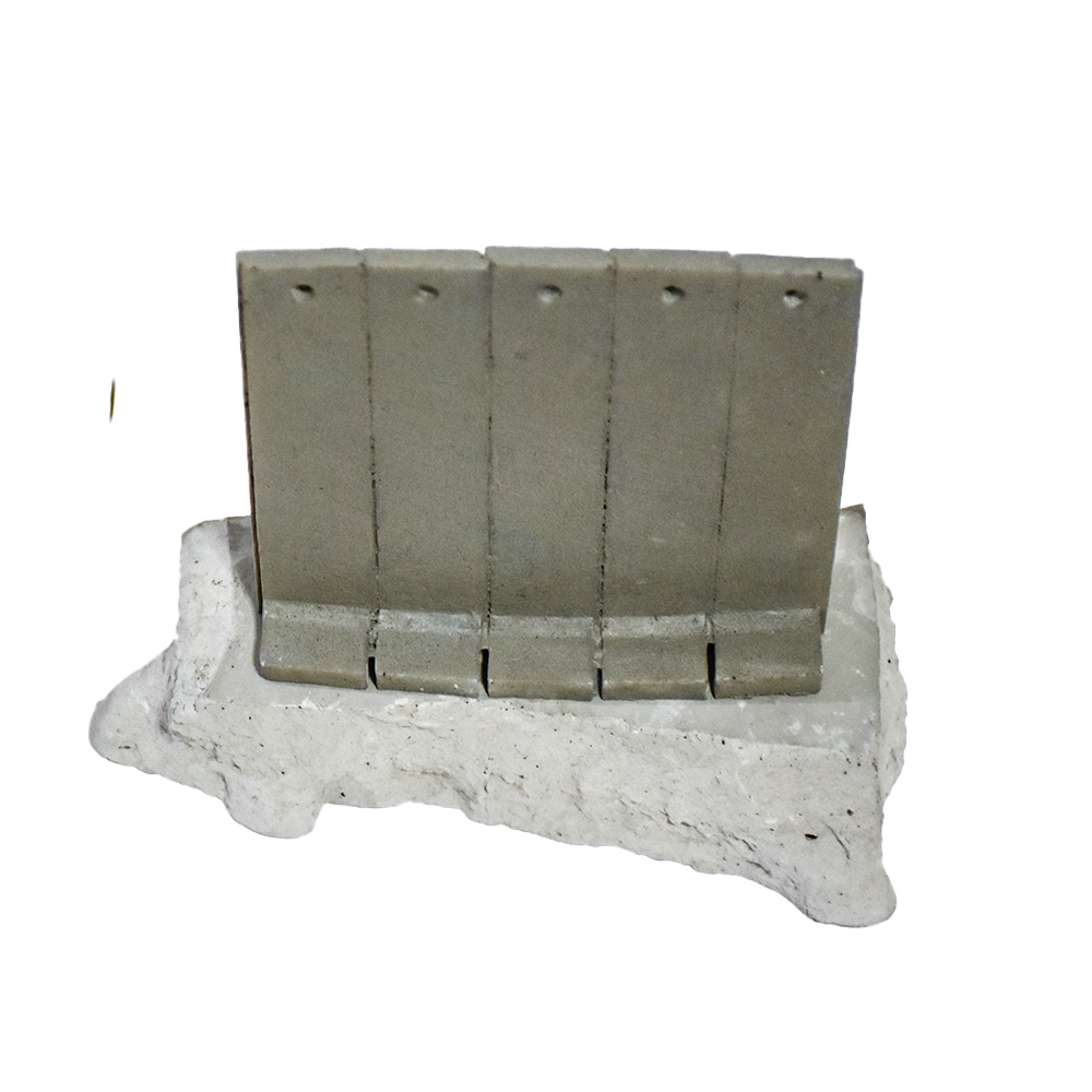 back view on stone base of banksy walled off hotel flower thrower wall sculpture