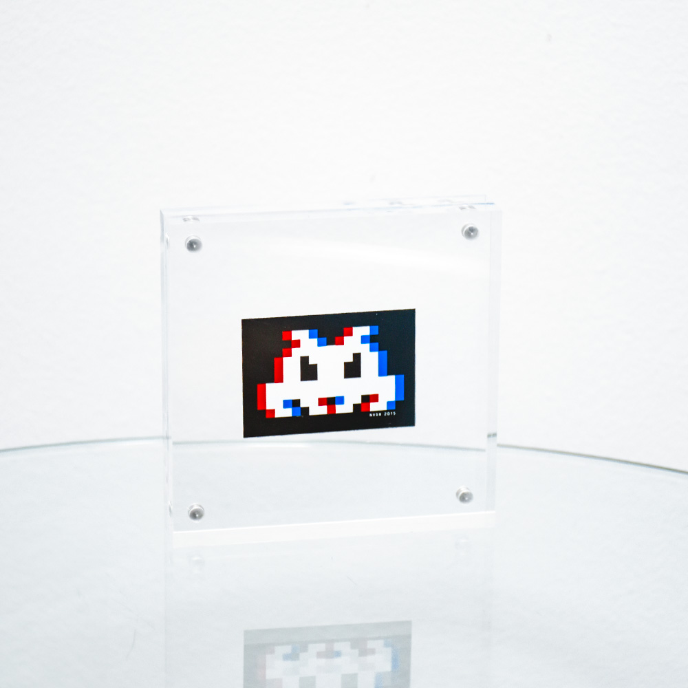 invader distortion sticker in clear frame.