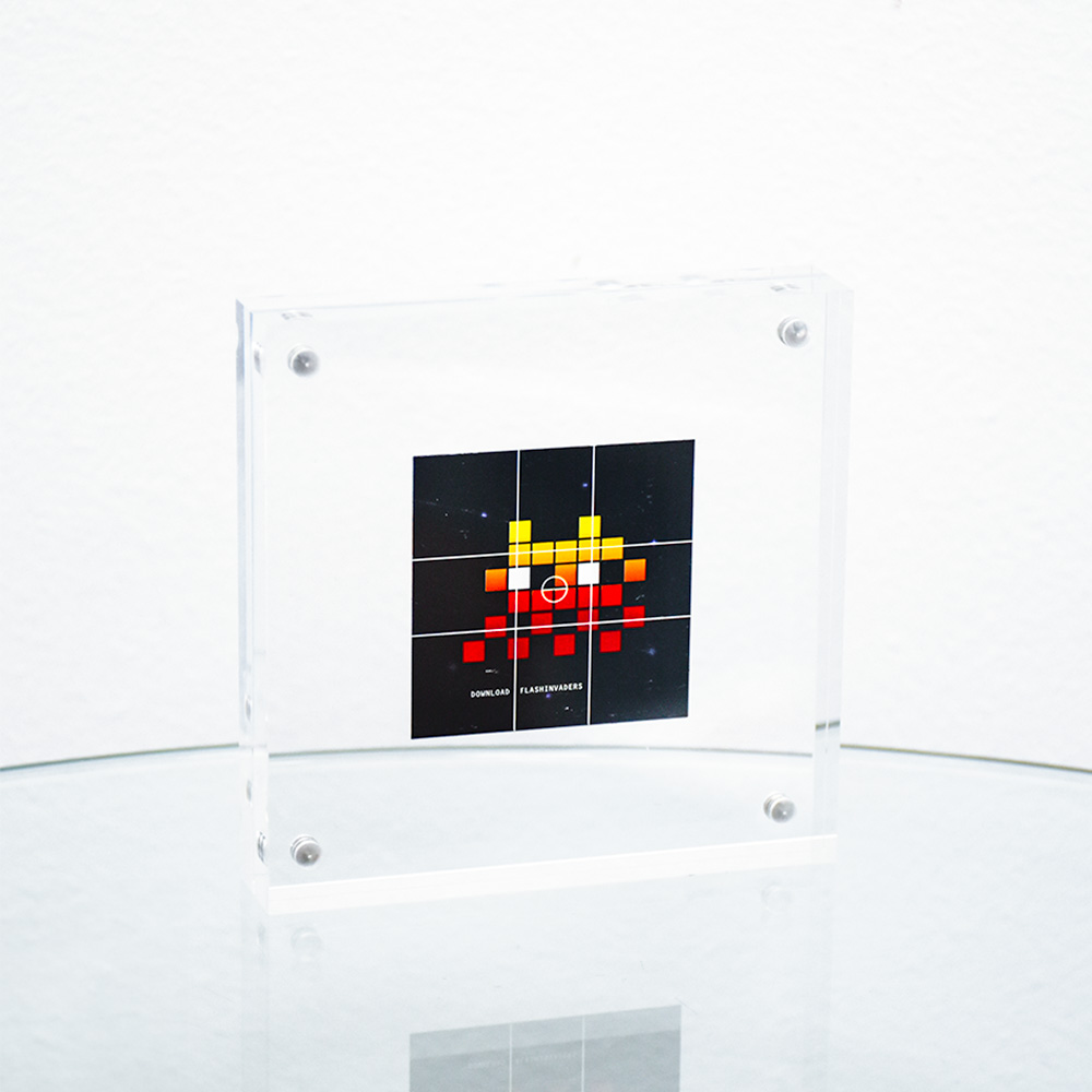 invader flashinvaders sticker in clear frame.