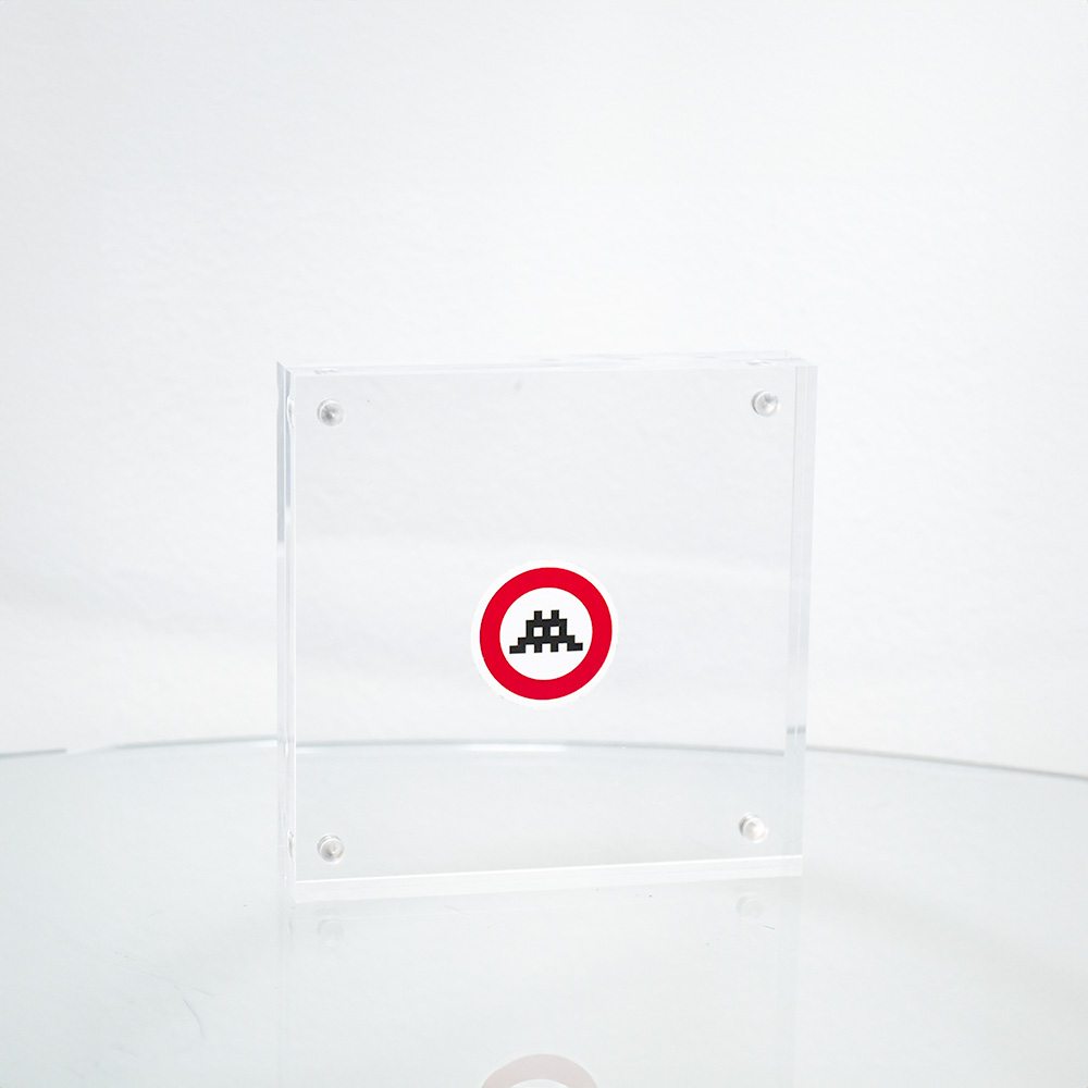 invader space warning small sticker in clear frame.