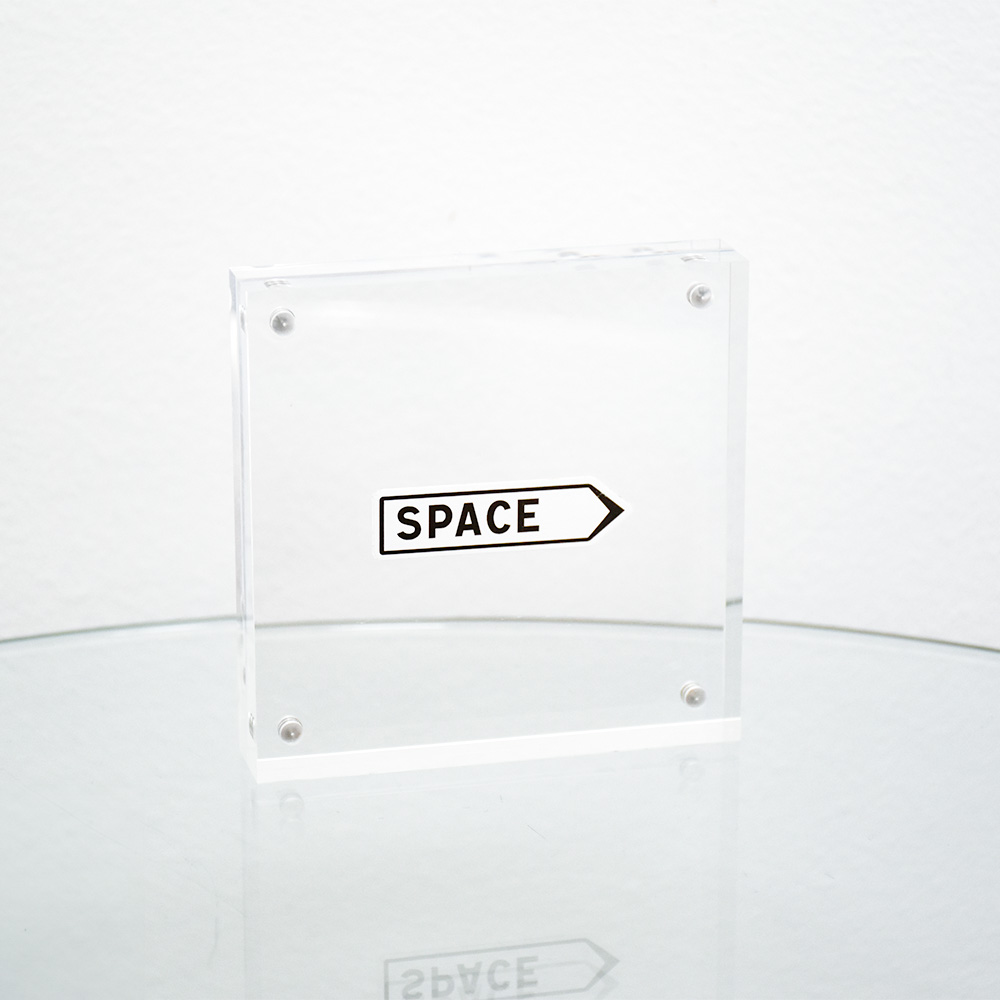 invader space sign sticker in clear frame.