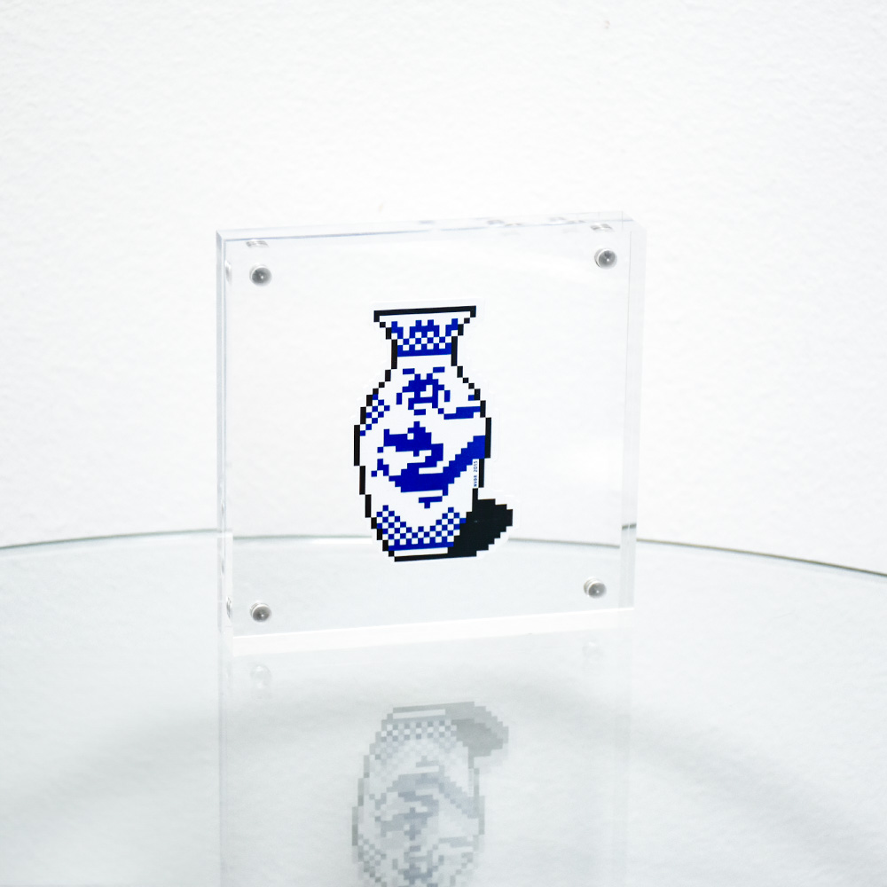 invader vase sticker in clear frame.