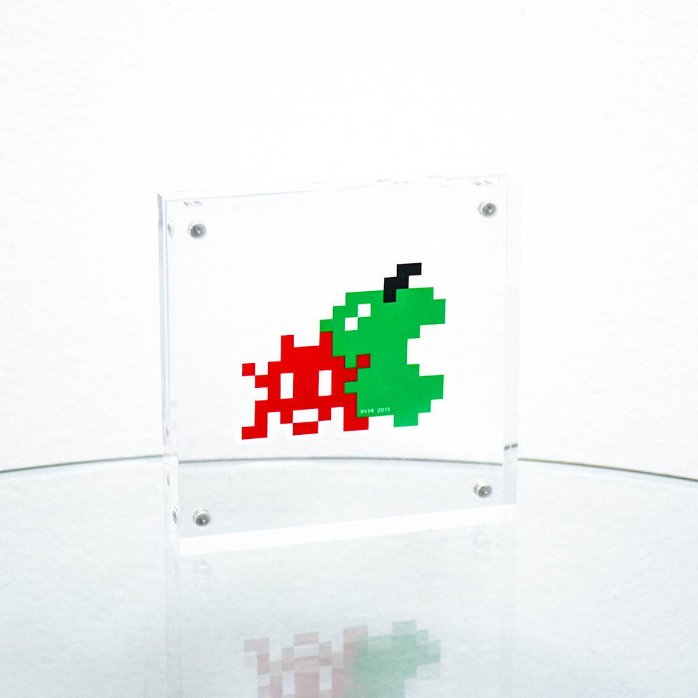 invader with apple sticker in clear frame.