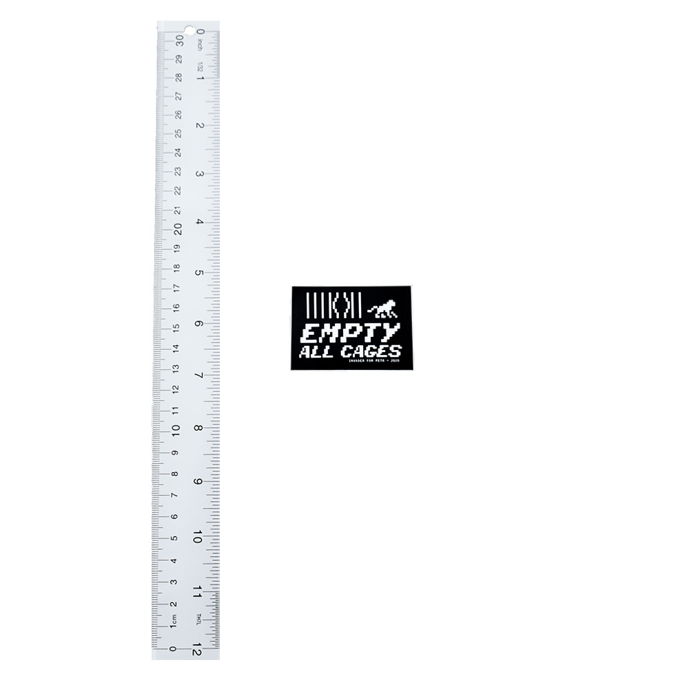 invader peta empty all cages sticker next to ruler