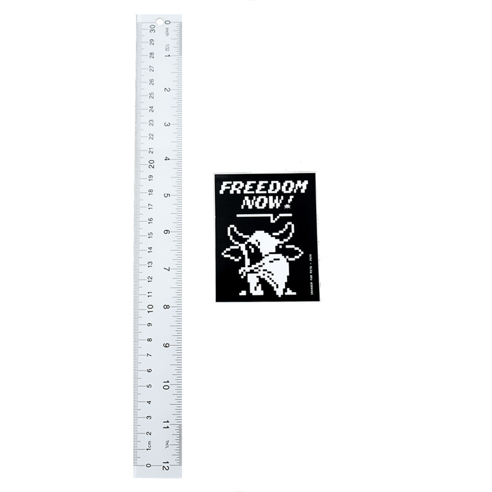 invader peta freedom now sticker next to ruler