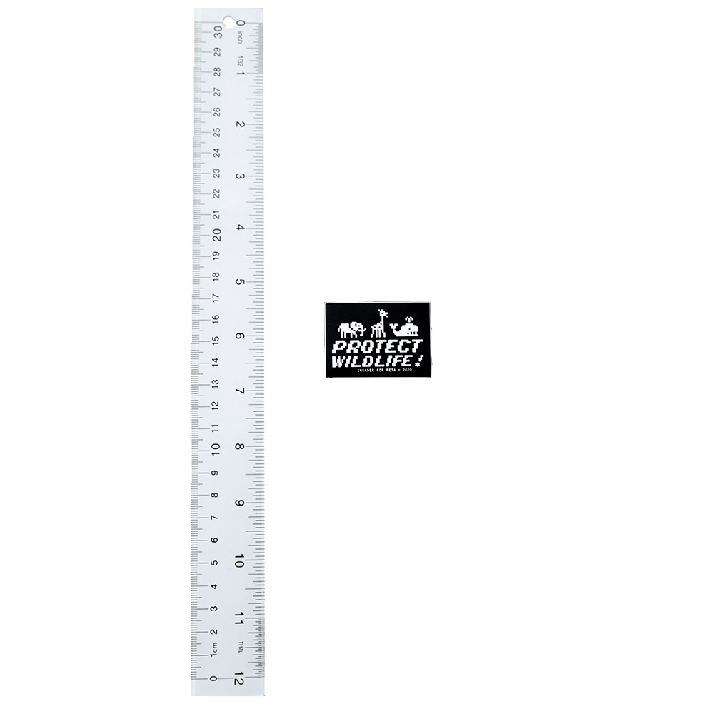 invader protect wildlife sticker next to ruler