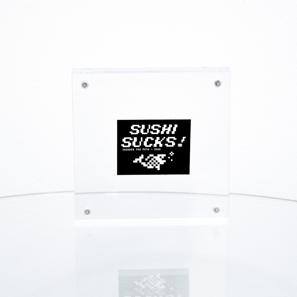 invader sushi sucks sticker in frame