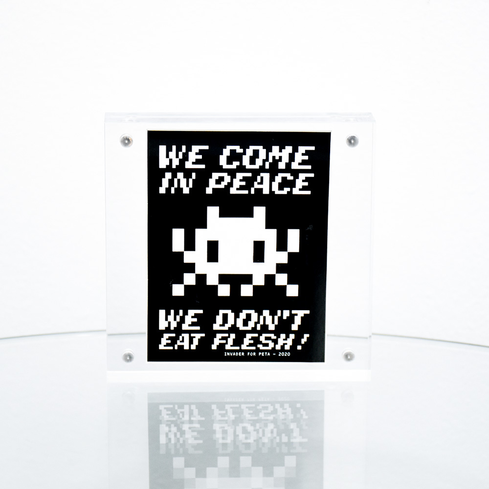 invader we come in peace sticker framed