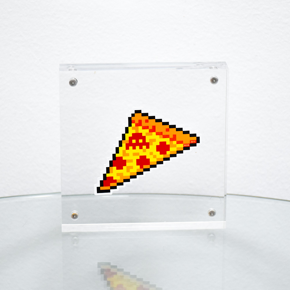 invader pizza sticker framed